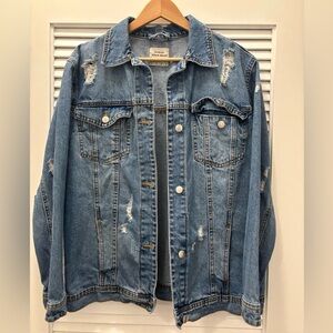 Distressed oversized denim jacket